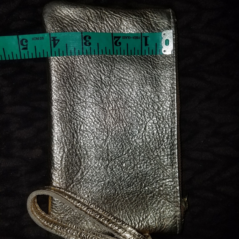 Metallic gold genuine leather wristlet bag